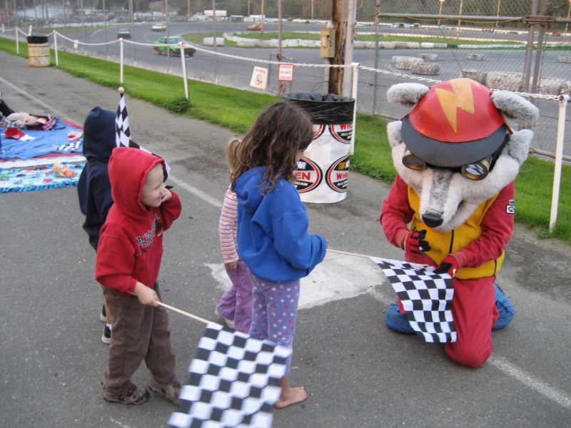 Racey Signing A Flag at Evergreen Speedway