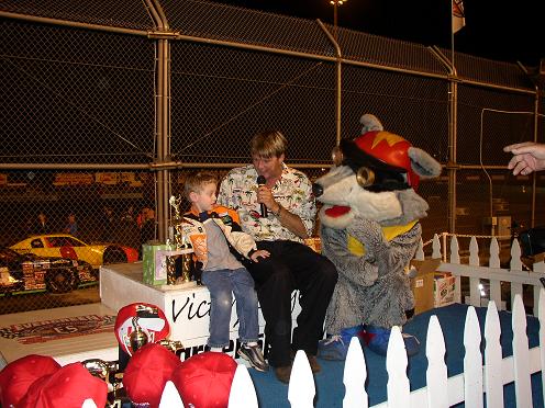Racey, Terry Buell and Kids Club Member at Evergreen Speedway