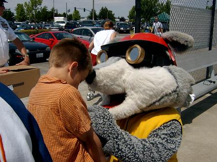 Racey Signing A Shirt at Evergreen Speedway
